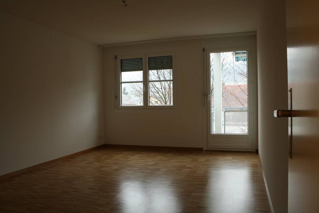Empty bedroom with a French door.